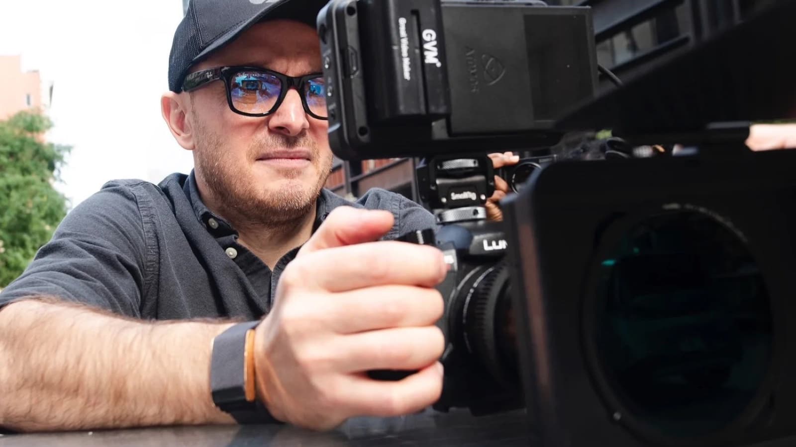 Beka operating a cinema camera on a New York filming day